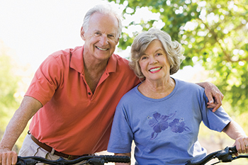 Photo of a man and woman on bicycles. Link to Life Stage Gift Planner Ages 60-70 Situations. Photo of a man and woman on bicycles. Link to Life Stage Gift Planner Ages 60-70 Situations.