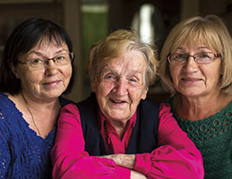 Photo of three smiling women. Links to Gifts by Estate Note